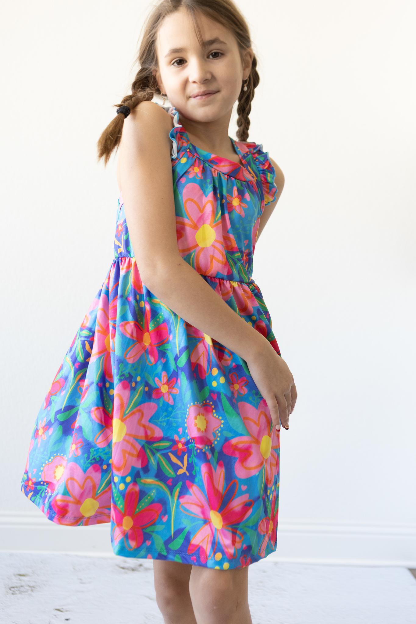 Mila & Rose:  Springing Around Ruffle Cross Back Dress