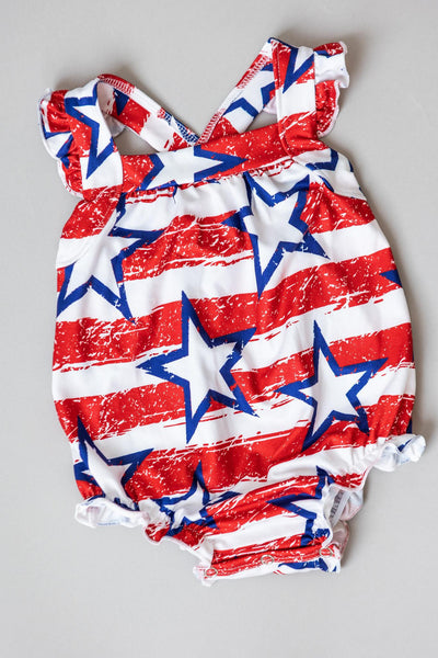 Mila & Rose:  Stars & Stripes Ruffle Cross Back Romper