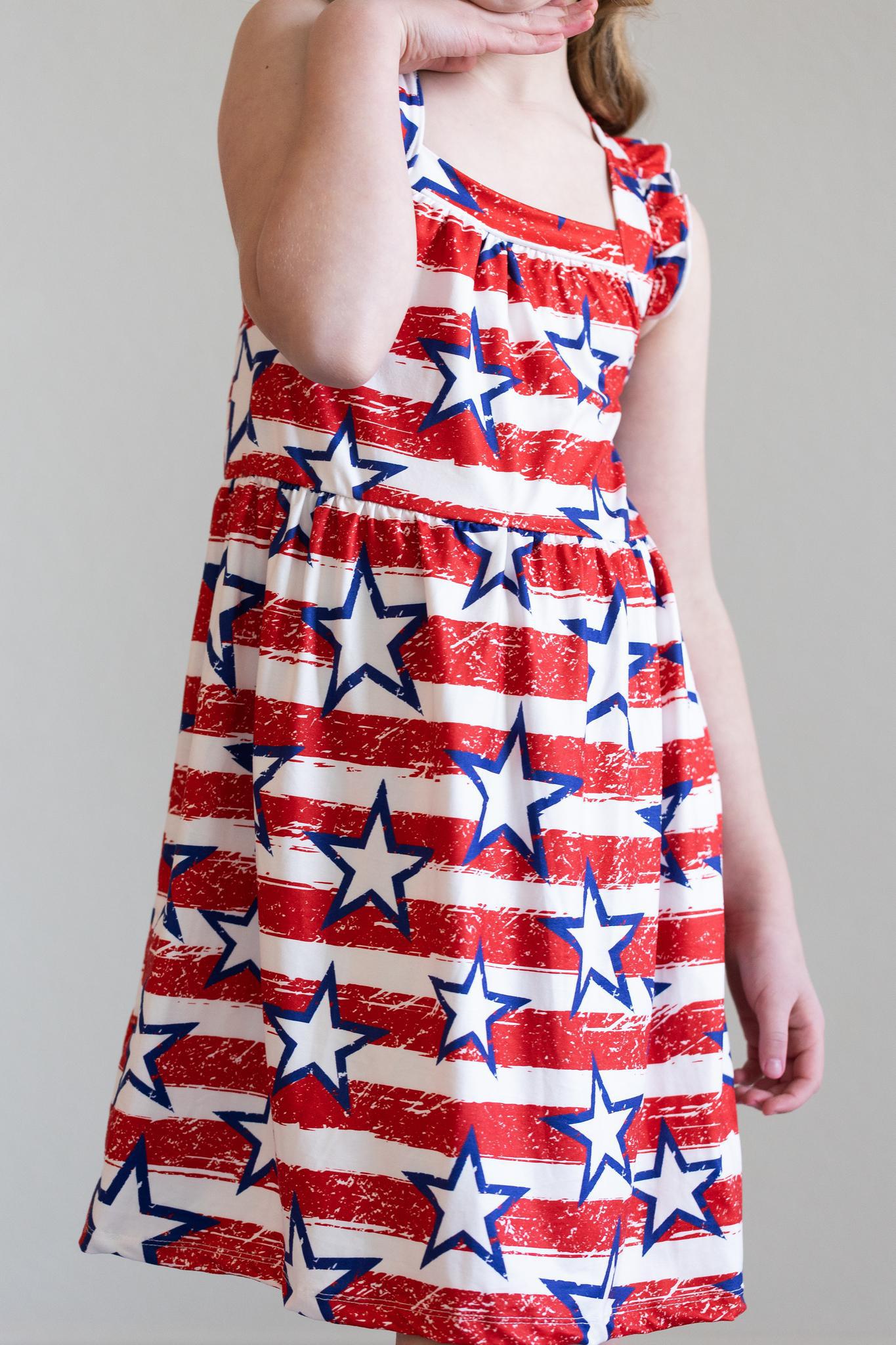 Mila & Rose:  Stars & Stripes Ruffle Cross Back Dress