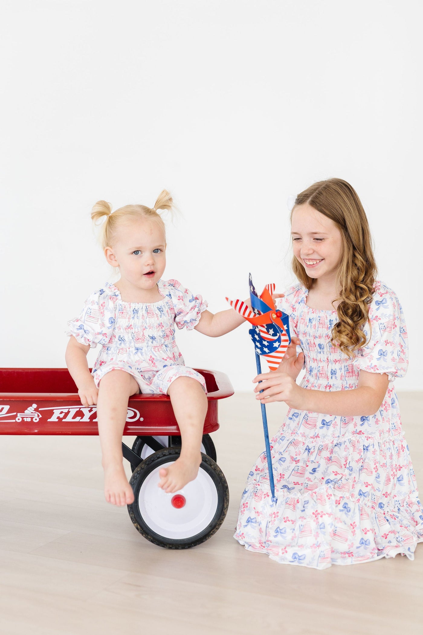 Mila & Rose:  Vintage Flags Smocked Ruffle Dress