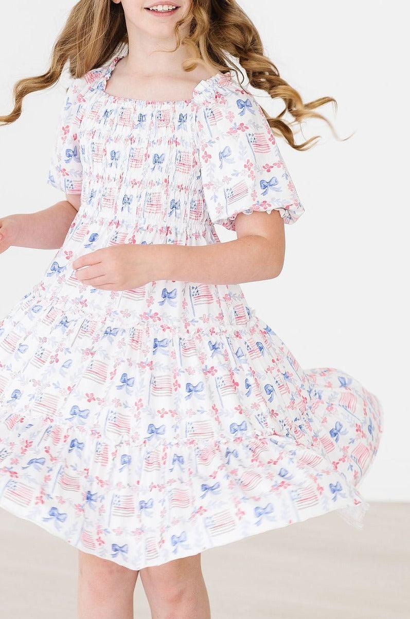 Mila & Rose:  Vintage Flags Smocked Ruffle Dress