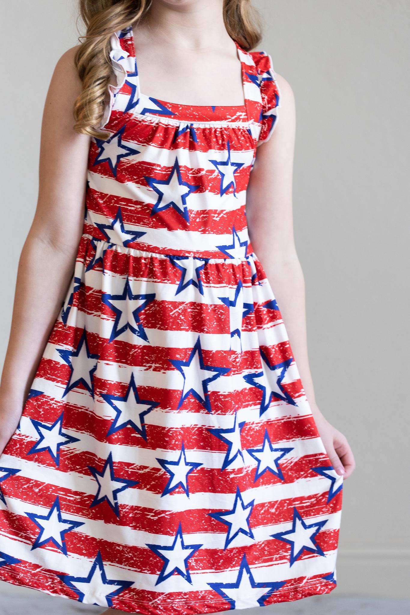 Mila & Rose:  Stars & Stripes Ruffle Cross Back Dress