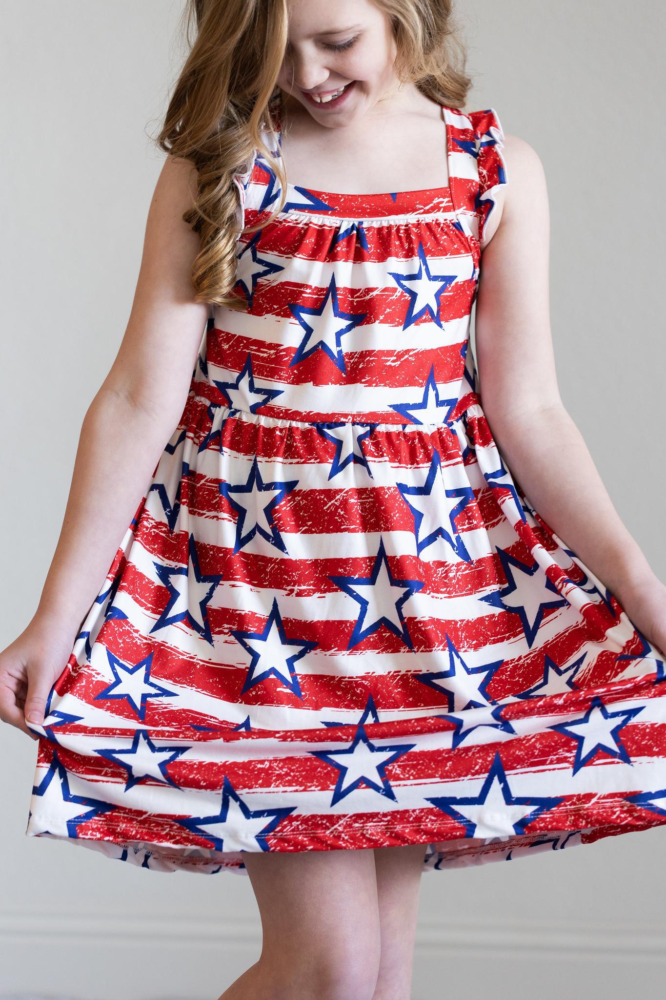 Mila & Rose:  Stars & Stripes Ruffle Cross Back Dress